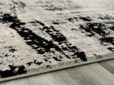Best Deals Furniture - Ashley Furniture - Zekeman 5'3" x 7'7" Rug - 5'3" x 7'7" Rug - R404922